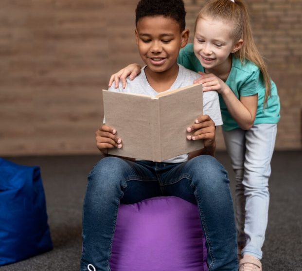 full-shot-kids-reading-together