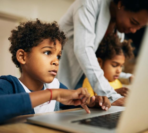 small-black-boy-elearning-computer-home